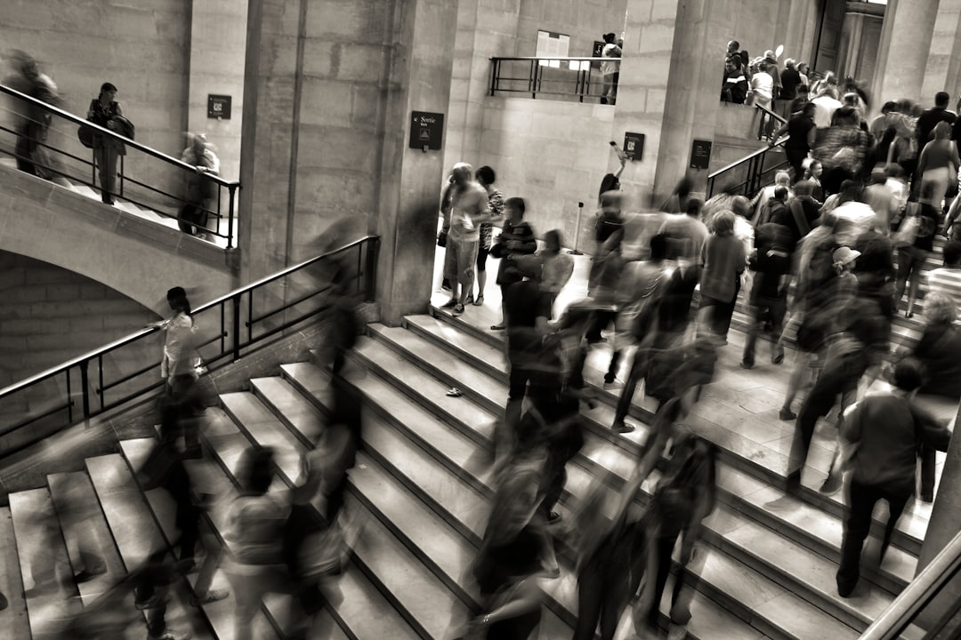 Photo by José Martín Ramírez Carrasco group of people walking on the stairs
