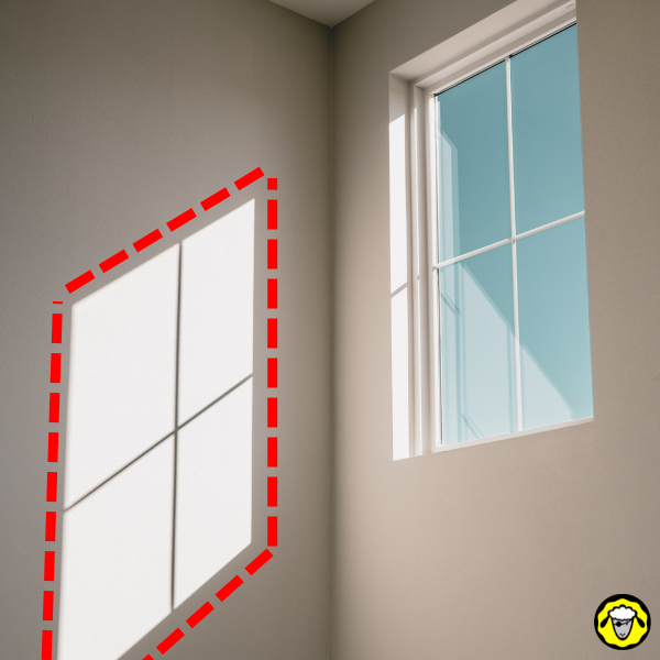Trace de soleil direct sur un mur intérieur près d une fenêtre Trace de soleil direct sur un mur intérieur près d une fenêtre